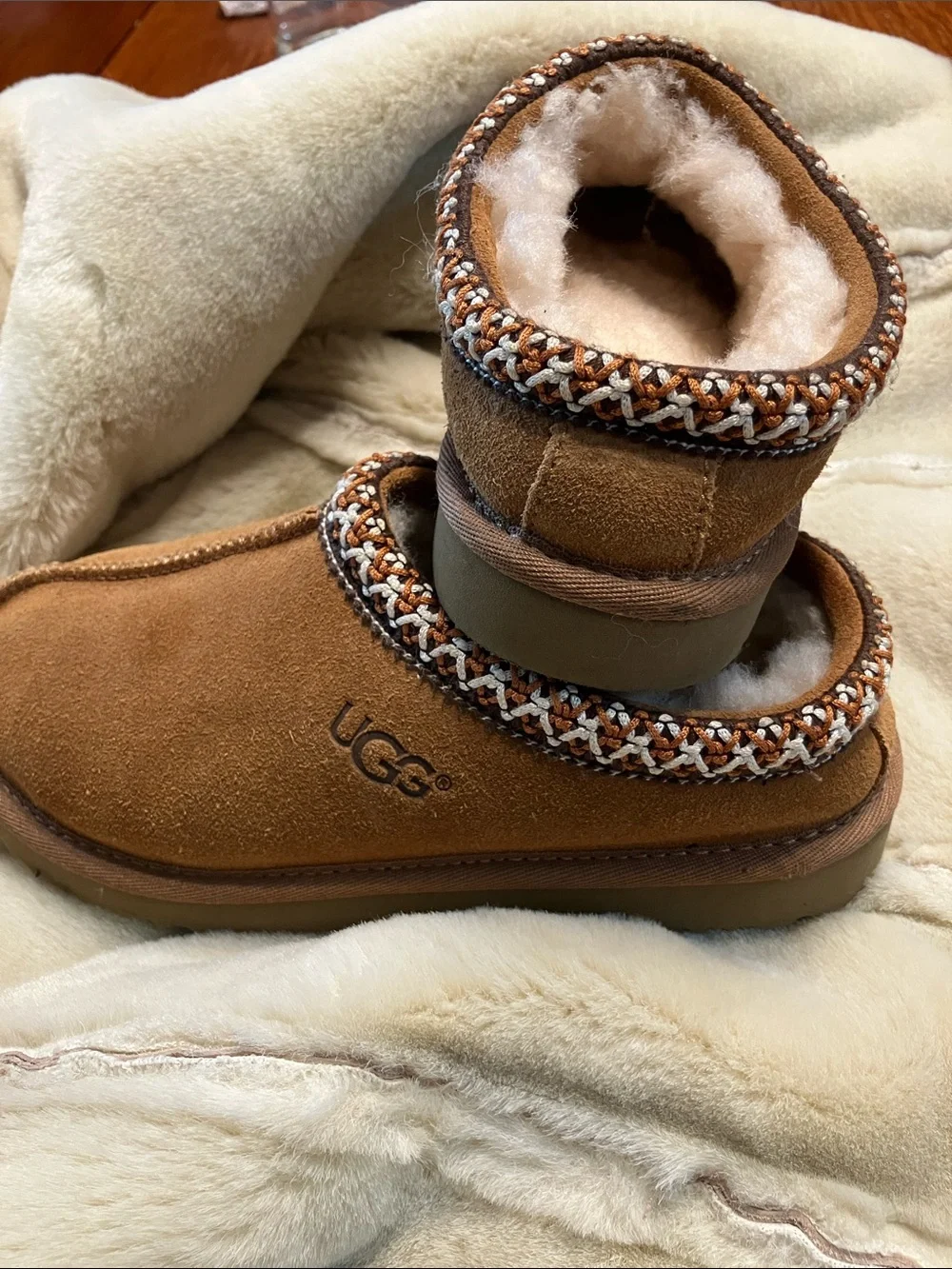 UGG Kids Chestnut Suede Sheepskin Lined Slip-On Slippers with Braided Trim
